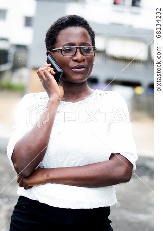 portrait of young woman on the phone. portrait of young woman on the phone. 68134232