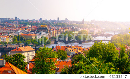 Bridges of Prague over Vltava River on sunny summer day. Prague, Czech Republic Bridges of Prague over Vltava River on sunny summer day. Prague, Czech Republic 68135247