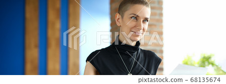 Musician holding paper with notes 68135674