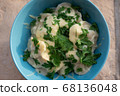 Homemade dumplings, traditional dumplings with meat, greens and cheese 68136048