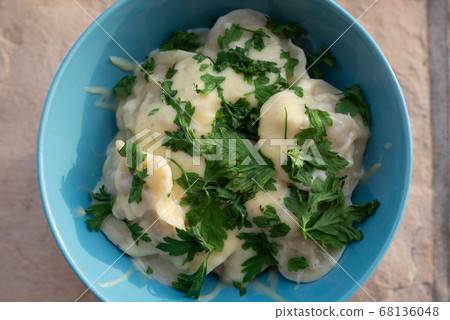 Homemade dumplings, traditional dumplings with meat, greens and cheese Homemade dumplings, traditional dumplings with meat, greens and cheese 68136048