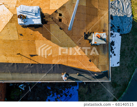 Remove old shingle roof and applying new shingles 68140515