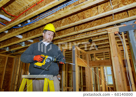 Interior frame of a new house under construction 68140800