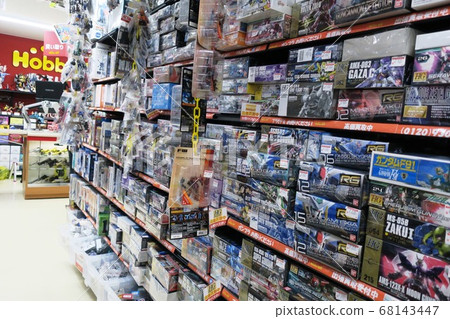 Inside a hobby shop lined with plastic models Inside a hobby shop lined with plastic models 68143447