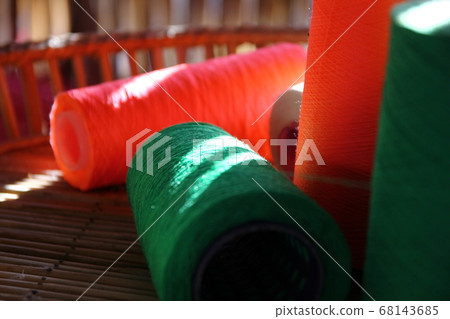 close up green yarn on spool.lighting and shadow 68143685
