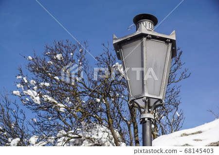 Vintage Street lamp post at winter day Vintage Street lamp post at winter day 68145403