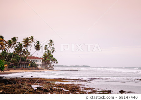 Sunset at Turtle beach in Hikkaduwa, Sri Lanka Sunset at Turtle beach in Hikkaduwa, Sri Lanka 68147440