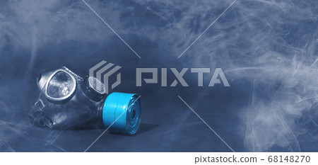 Vintage gasmask isolated on black - Smoke in the Vintage gasmask isolated on black - Smoke in the 68148270