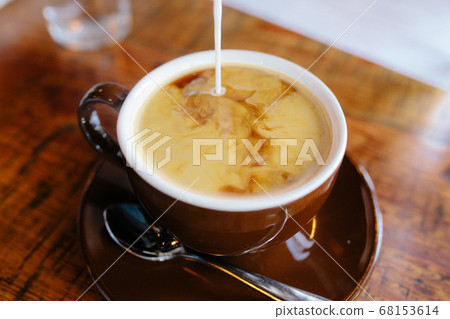 Cup of coffee awakening Cup of coffee awakening 68153614