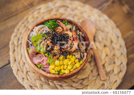 Poke bowl with shrimp, corn, avocado, ginger and mushrooms 68156877