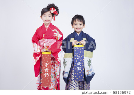 Child with Chitose candy 68156972