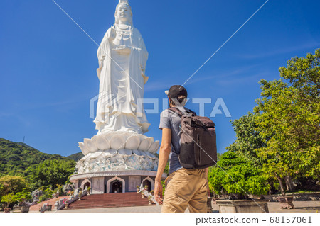 Man tourist in Chua Linh Ung Bai But Temple, Lady Buddha Temple in Da Nang, Vietnam Man tourist in Chua Linh Ung Bai But Temple, Lady Buddha Temple in Da Nang, Vietnam 68157061