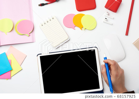 white electronic tablet and wireless mouse, the 68157925