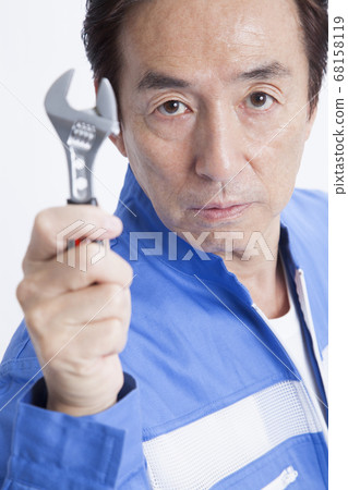 Mechanic with a wrench Mechanic with a wrench 68158119