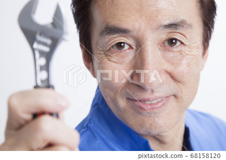 Mechanic with a wrench Mechanic with a wrench 68158120