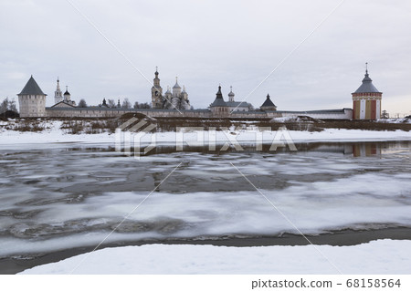 View of the Savior-Prilutskii Monastery from opposite coast Vologda River in March 68158564