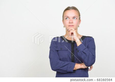 Studio shot of young beautiful blonde businesswoman Studio shot of young beautiful blonde businesswoman 68160564