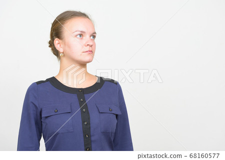 Studio shot of young beautiful blonde businesswoman Studio shot of young beautiful blonde businesswoman 68160577