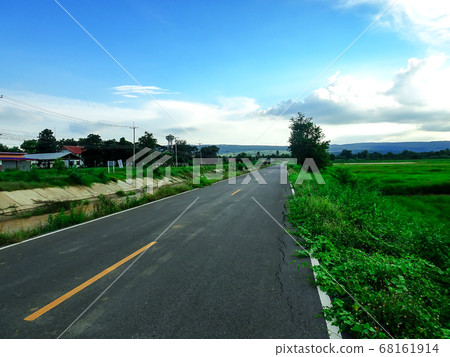 A curved path on a country road A curved path on a country road 68161914