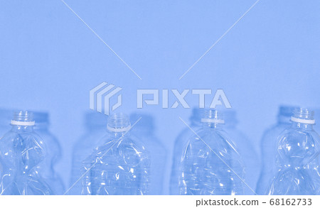Plastic bottles isolated on blue background. Plastic bottles isolated on blue background. 68162733