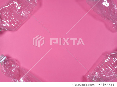 Plastic bottles isolated on pink background. Plastic bottles isolated on pink background. 68162734