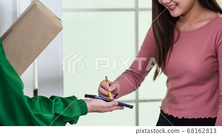 sign on phone to receive parcel. delivery service 68162813