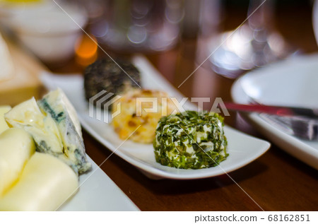 Set with different appetizers in small portions, Set with different appetizers in small portions, 68162851