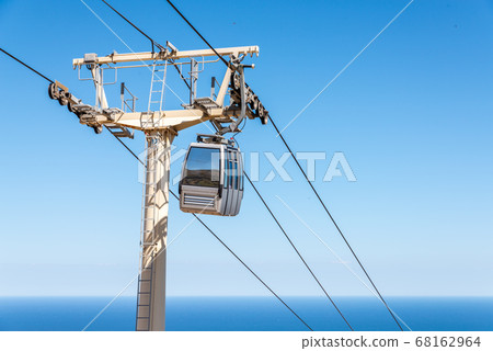 cableway against the sky, transport at height and cableway against the sky, transport at height and 68162964