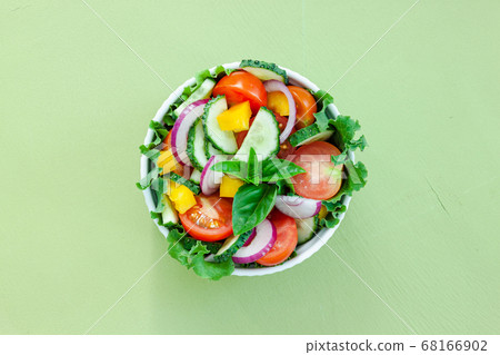 Green salad with tomato and fresh vegetables Green salad with tomato and fresh vegetables 68166902