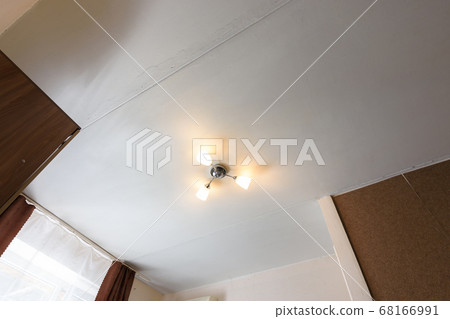 View of the old ceiling in need of repair in the View of the old ceiling in need of repair in the 68166991