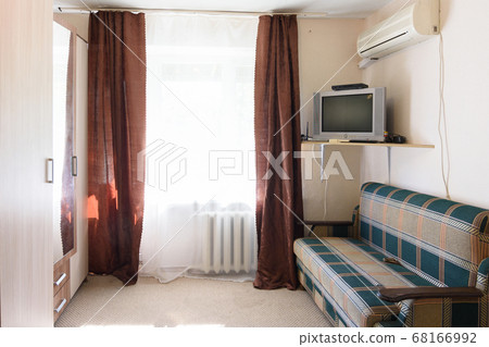 Interior of a budget room in an old hotel Interior of a budget room in an old hotel 68166992