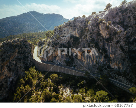 Road in the mountains. Beautiful landscape. Spain, Majorca. Aerial view from a drone. 68167787