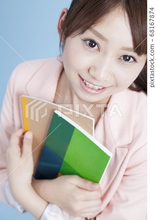 Smiling female college student 68167874