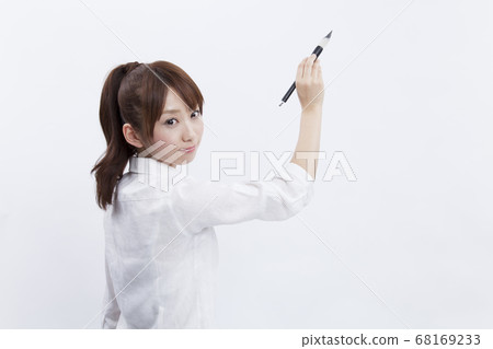 Female doing calligraphy Female doing calligraphy 68169233