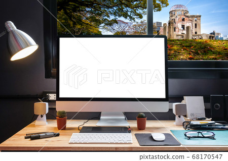 Graphic designer's workspace equipped with a pen 68170547