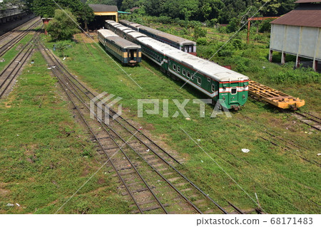 Dhaka, the capital of Bangladesh, vehicles at the Komulapur station platform and tracks 68171483