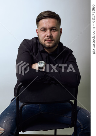 Portrait Cool Male, Sitting On Chair, Hands Crossed. Confident, Strong People. 68172060