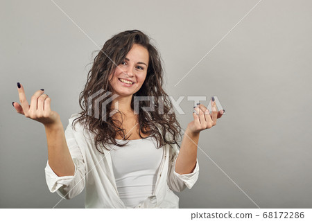 Wide open arms, incredulity, doubt beautiful woman. Is surprised spread palms Wide open arms, incredulity, doubt beautiful woman. Is surprised spread palms 68172286