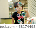 Soap bubble girl 68174498