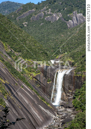 Beautiful Chihiro waterfall in Yakushima, autumn sky 68175710