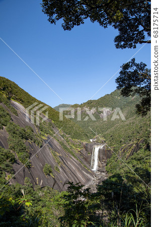 Beautiful Chihiro waterfall in Yakushima, autumn sky 68175714