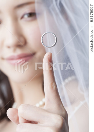 Wedding rings and bride 68176097