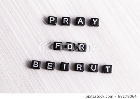 Pray for Beirut sign. Show of support in response to 2020 Lebanon Explosion. Message of solidarity and support. Words pray for Beirut on white background. Pray for Beirut sign. Show of support in response to 2020 Lebanon Explosion. Message of solidarity and support. Words pray for Beirut on white background. 68179064