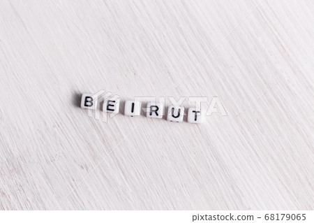 Letter block in word Beirut on white wood background. Lebanon concept. Letter block in word Beirut on white wood background. Lebanon concept. 68179065