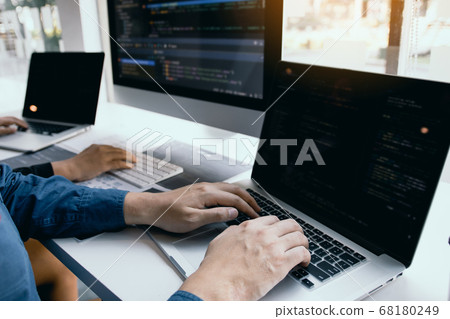 Two software developers are analyzing together 68180249