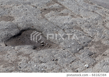 asphalt damaged road 68182384