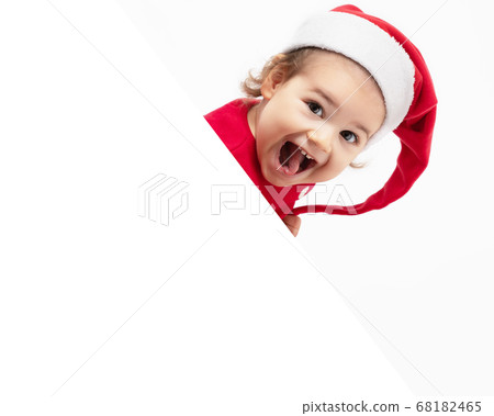 Adorable baby girl is happy smiling for christmas Adorable baby girl is happy smiling for christmas 68182465