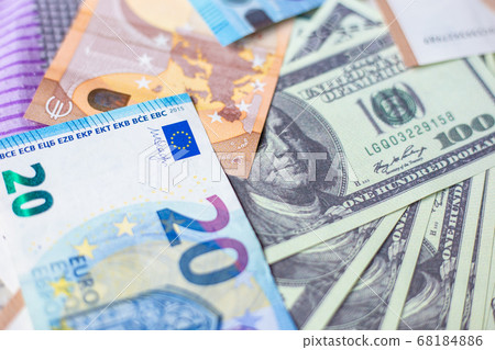 US dollar money around with Euro money 68184886