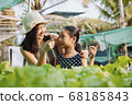 Two sister in organic farm. agriculture concept. 68185843