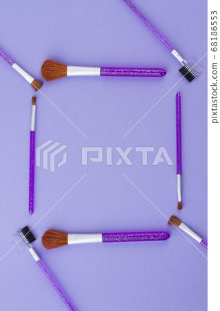 Square frame made of purple brushes. 68186553